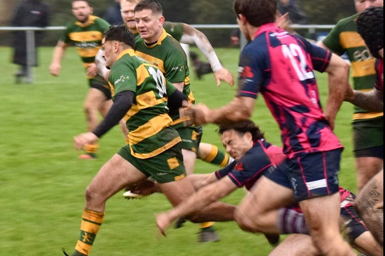 A Newent player makes a break in Saturday's victory over Stourbridge