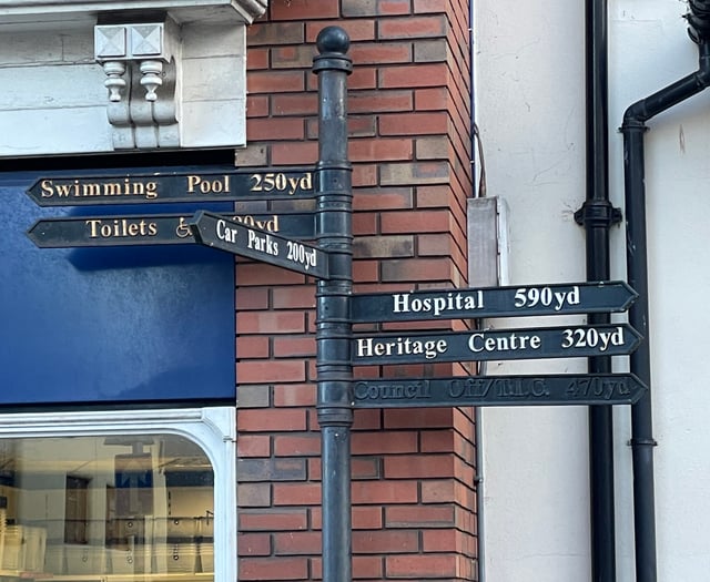 Town's iconic wayfinding signs up for grabs