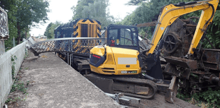 Digger on train which pulled down 133-year-old bridge loaded wrongly 