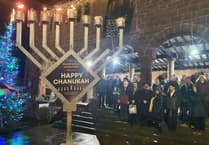 Hanukkah Menorah Lighting in shows community solidarity
