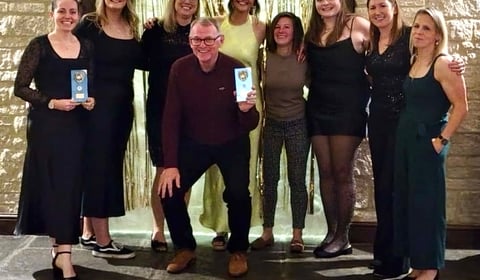 Aston's women celebrate with 100 trophy ahead of 50th anniversary