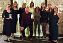 Aston's women celebrate with 100 trophy ahead of 50th anniversary