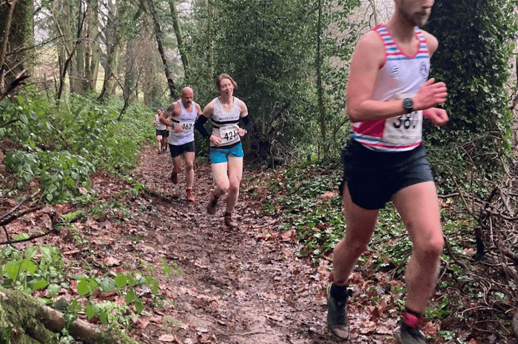 Runners race through the woods in Sunday's Kymin Winter race
