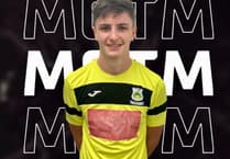 Ten-man Hill hang on to climb out of dropzone