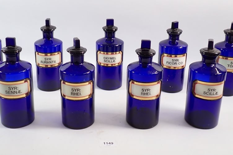 Nine Chemist's Bottles