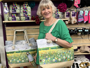 Sue's art collection debuts at town's Scope store