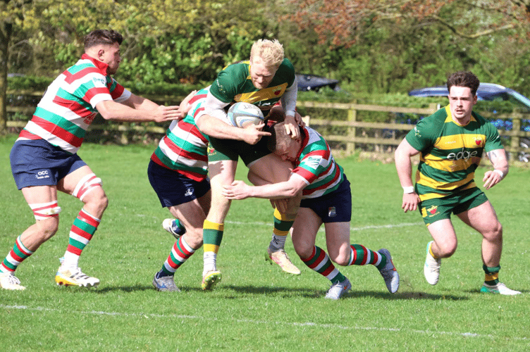 A Newent player tries to break through