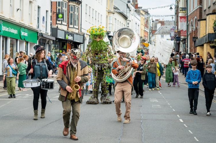 The parade snakes its way down Monnow Street