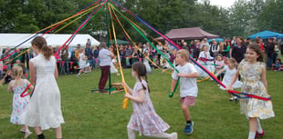 Llangrove villagers celebrate May Day with traditional maypole dance