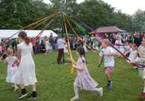 Llangrove villagers celebrate May Day with traditional maypole dance