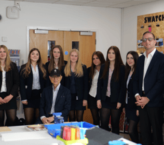 Professor Jimmy Choo inspires students in fashion workshop