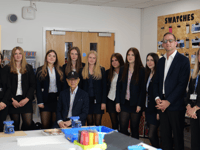 Professor Jimmy Choo inspires students in fashion workshop