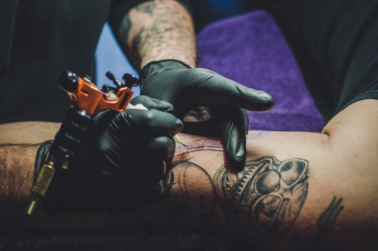 Tattooist at work