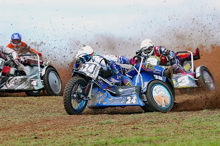 1,000cc sidcear action with Terry Saunters and Liam Brown leading a battle