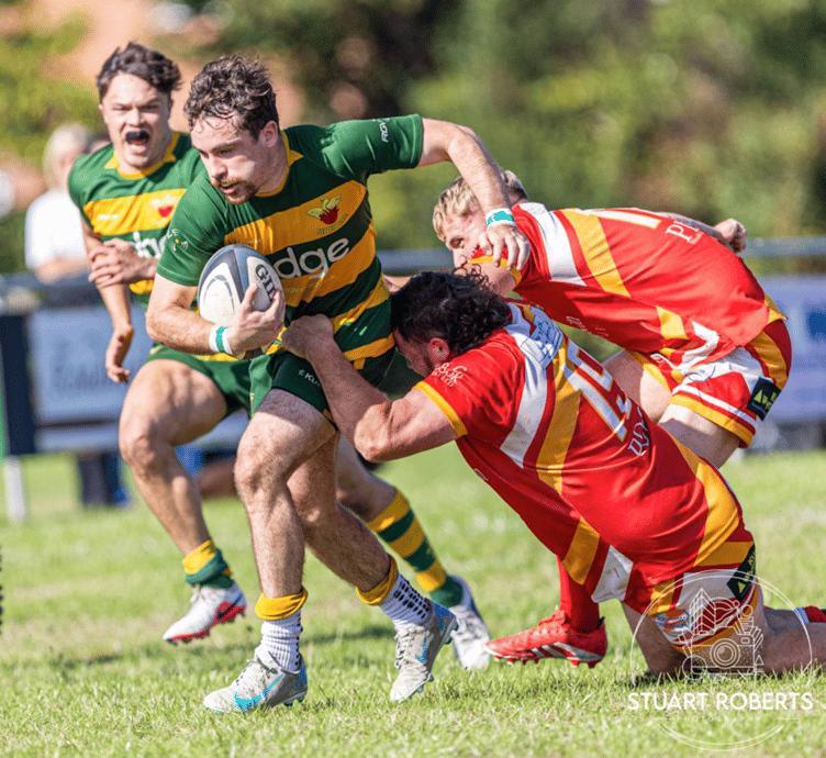 A Newent player makes a break against Longlevens. Photo: Stuart Roberts