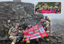 Three firefighters conquer UK's peaks for charity