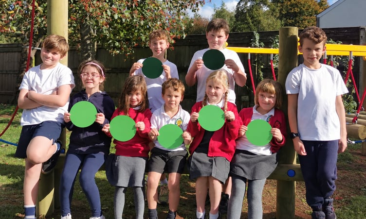 Llangrove Academy pupils pictured with their respective grades