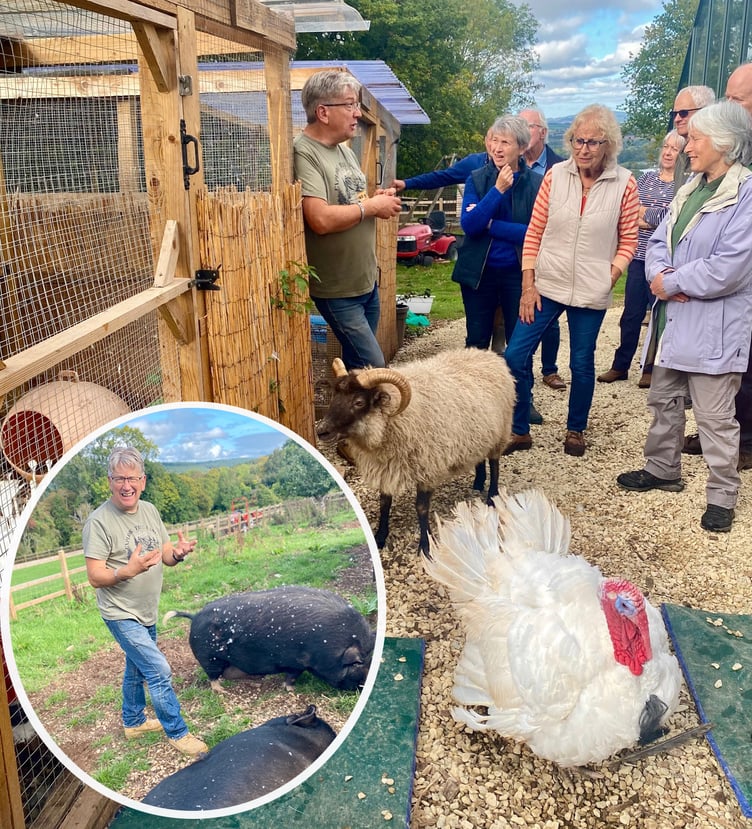 Peter Gill talks to the representatives of the Phoenix Theatre at the Pen-y-Bryn Animal Sanctuary