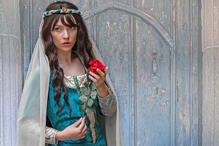 John Crowland’s image of a woman holding a rose.